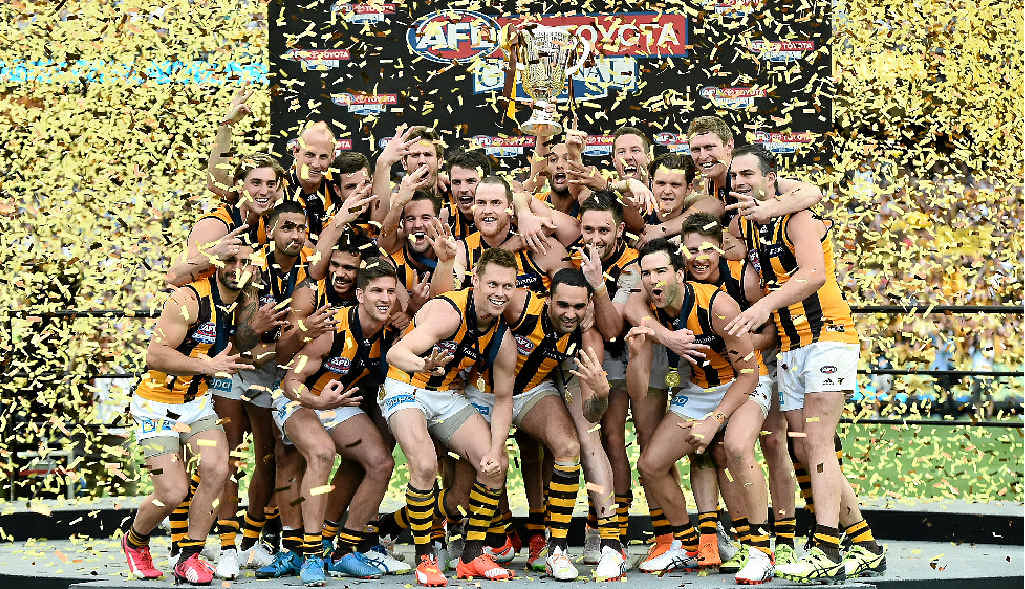 THREE-PEAT: Hawthorn Hawks celebrate winning the AFL Grand Final against the West Coast Eagles at the MCG on October 3. THREE-PEAT: Hawthorn Hawks celebrate winning the AFL Grand Final against the West Coast Eagles at the MCG on October 3.